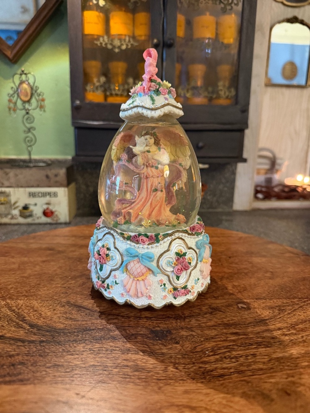 vintage snow globe egg featuring a sweet little angel!